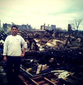 A man in front of his house in the Rockaways