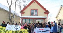 Photo ofOccupy Homes MN members in front of home