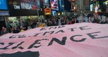 “End Climate Silence” parachute at Time Square on October 28