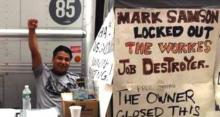 Hot and Crusty Worker Holds up Fist