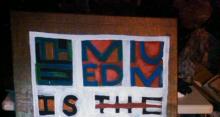 Sign reading: The medium is our message