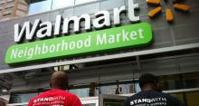 Workers in front of Walmart