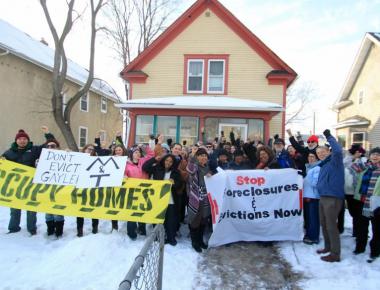 Photo ofOccupy Homes MN members in front of home