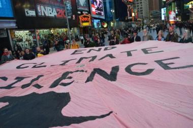 “End Climate Silence” parachute at Time Square on October 28