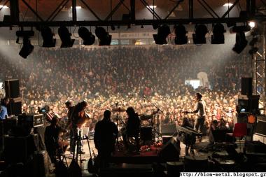 Photo of band playing concert in solidarity with collective factory